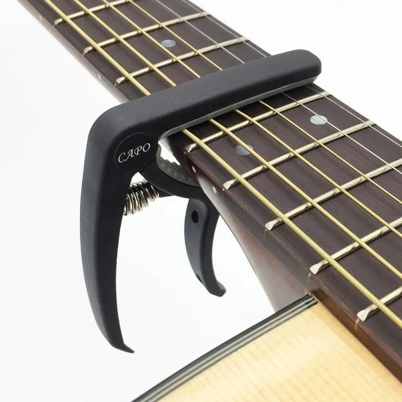 Plastik Gitar Capo 6 Dize Akus - Musical Instrument Gif incelemesi ve fiyatı