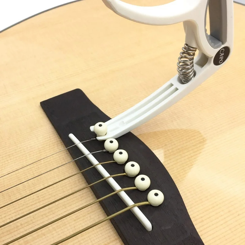 Plastik Gitar Capo 6 Dize Akus - Musical Instrument Gif incelemesi ve fiyatı