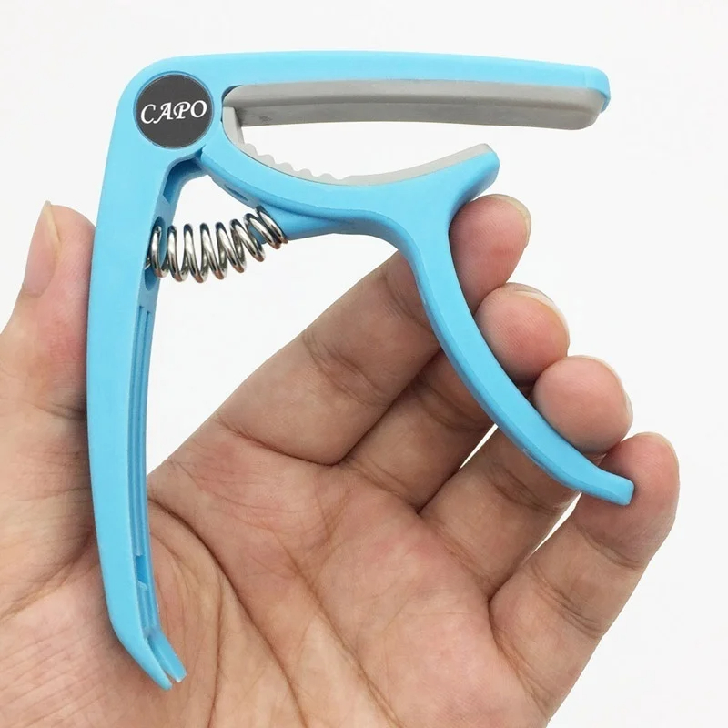 Plastik Gitar Capo 6 Dize Akus - Musical Instrument Gif incelemesi ve fiyatı